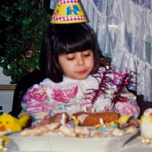 Photo of Sadia as a baby eating