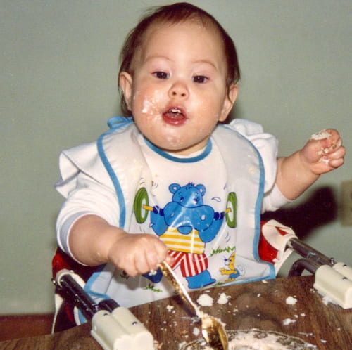 Photo of Suzy as a baby eating