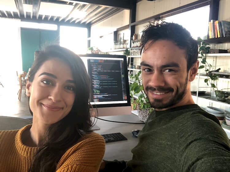 Photo of Sadia and Robin working together on the website.