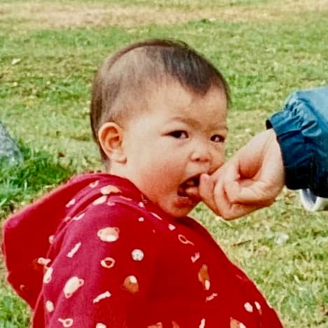 Photo of Alyssa as a baby eating